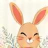An illustration of a small, happy bunny or other gentle animal